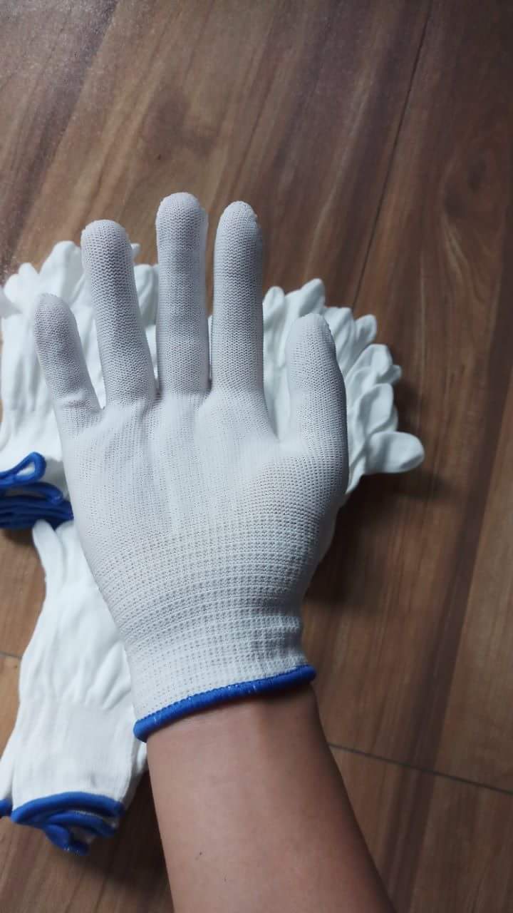Găng tay mút trắng